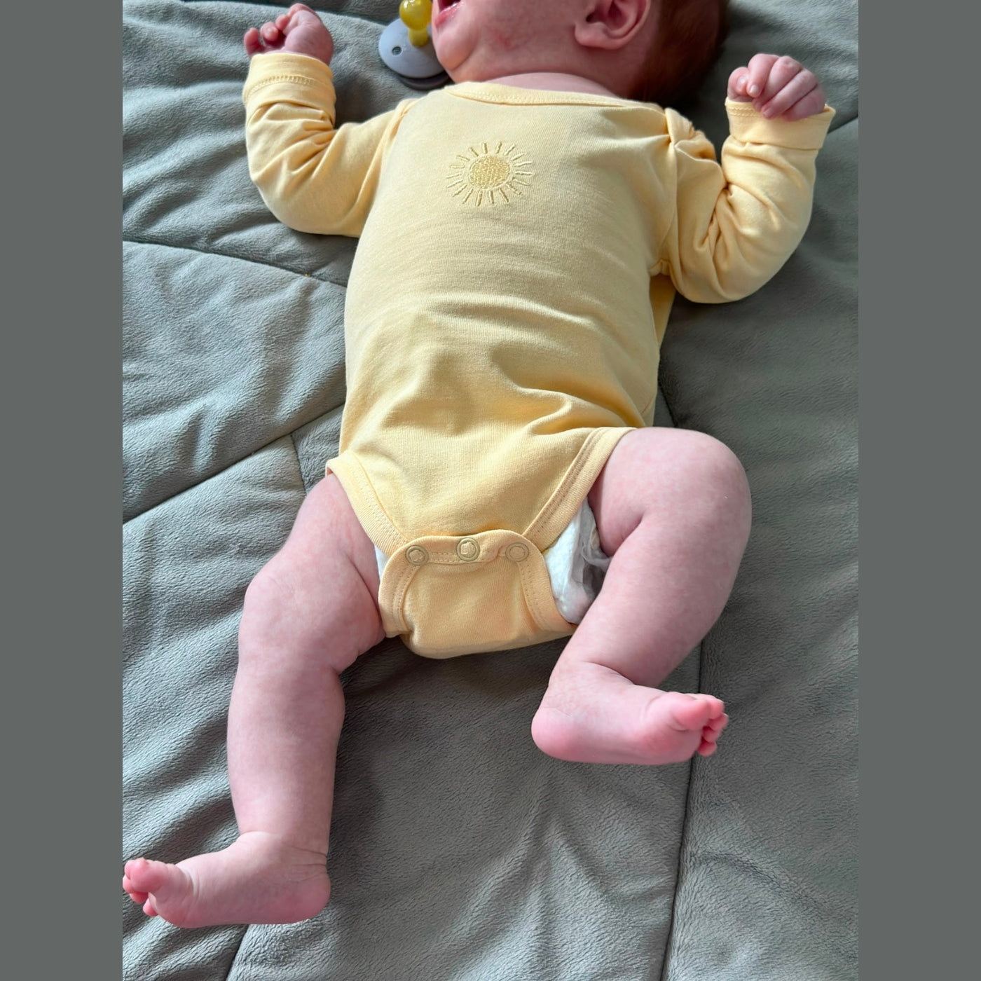 Romper Apricot Glow with embroidery